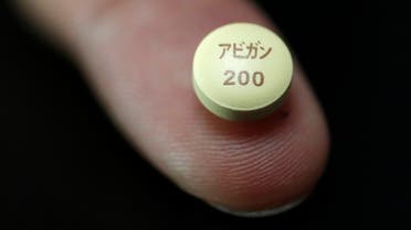 A tablet of Avigan (generic name : Favipiravir), a drug approved as an anti-influenza drug in Japan. (File photo: Reuters)