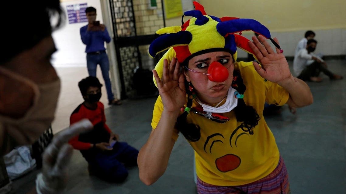 HEALTH-CORONAVIRUS-INDIA-CLOWN- Reuters