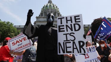 Protestors against coronavirus restrictions gather for a rally outside the Pennsylvania State Capitol Building in Harrisburg, Pennsylvania, US, May 15, 2020. (Reuters) 