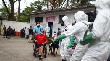 Brazilian army officers disinfect a shelter for elderly people, homeless and patients with mental disorders, amid concerns of the spread of the coronavirus, in Rio de Janeiro, Brazil, May 14, 2020. (Reuters)