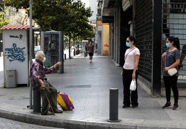 A old man solicits the charity of passers-by on the Lebanese capital Beirut's Hamra street. (Stock image)