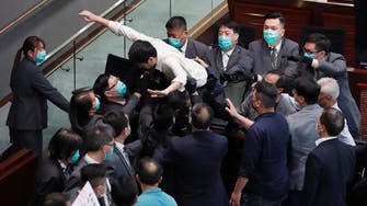 Hong Kong legislature to push ahead with China anthem bill after chaotic scuffles