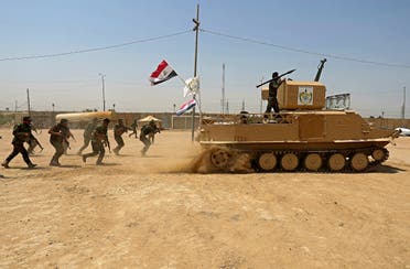 Shia volunteer fighters from the Imam Ali Brigade, an armed faction with the Iraqi Popular Mobilization Forces, train at their camp, in Najaf, south of Baghdad, Iraq on July 18, 2017. (File photo: AP)
