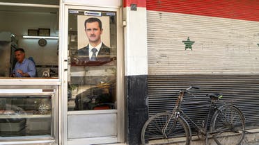 A picture of Syrian President Bashar al-Assad in Damascus, Syria April 22, 2020. (Reuters)