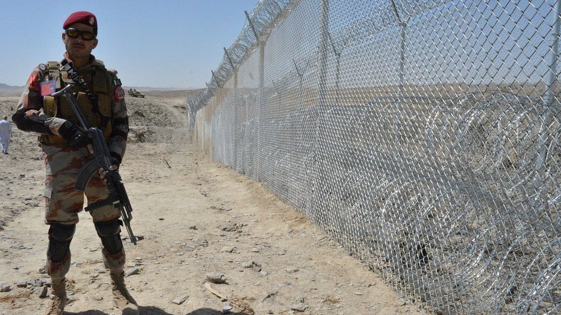 A Pakistani army soldier stands guard along with border fence at the Pak-Afghan border near the Punjpai area of Quetta in Balochistan on May 8, 2018. (AFP)