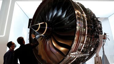 A man looks at Rolls Royce's Trent Engine displayed at the Singapore Airshow in Singapore February 11, 2020. REUTERS