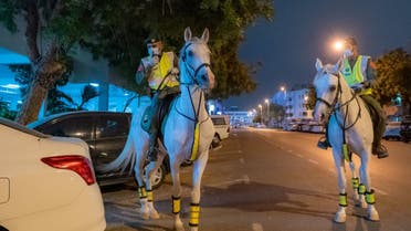 Dubai mounted police patrol the streets during coronavirus-related curfew hours. (Twitter)