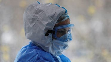 Doctor Irina Barkhatova wearing personal protective equipment (PPE) is seen in the Intensive Care Unit (ICU), ECMO Centre of the City Clinical Hospital Number 52 in Moscow, Russia April 28, 2020. (Reuters)