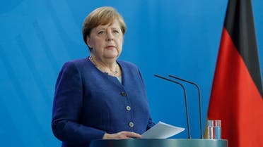 Merkel at a press conference following a meeting with international economic and Financial organizations at the Chancellery in Berlin, Germany, on May 20, 2020 on the effects of the novel coronavirus pandemic. (AFP)