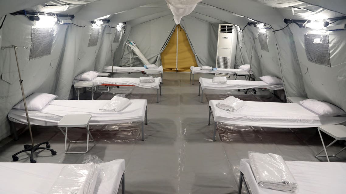 This picture taken on May 13, 2020 shows a view of bunk beds set up at a medical tent in a newly-opened field hospital to treat COVID-19 coronavirus patients in the Muslim holy city of Mecca in Saudi Arabia.