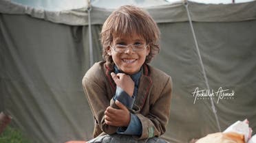 Mohammed, the refugee boy who traded in his glasses for a photograph. (Twitter)