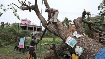Indian PM visits cyclone-hit Kolkata promising help, Bangladesh estimates damage