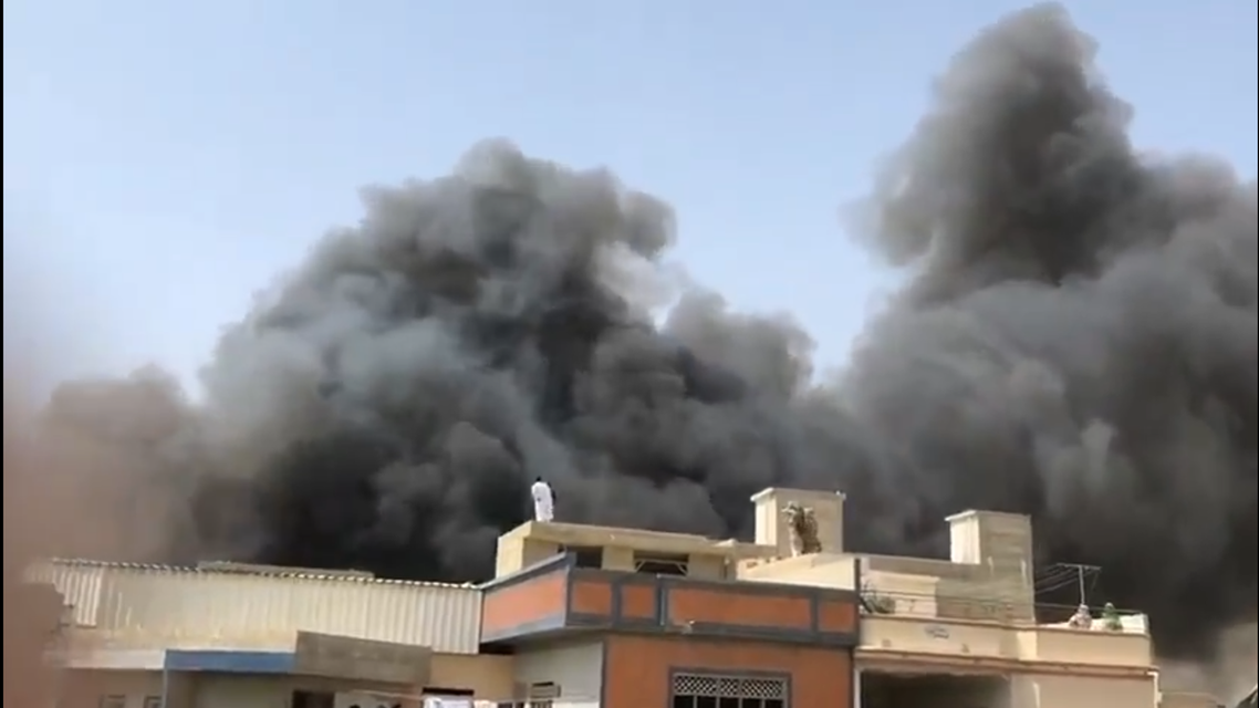 Unverified image reportedly showing the smoke billowing from the Pakistan International Airlines crash in Karachi. (Twitter, @YusraSAskari)