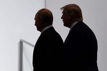 In this June 28, 2019, file photo, President Donald Trump and Russian President Vladimir Putin walk to participate in a group photo at the G20 summit in Osaka, Japan. (AP)