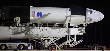 A SpaceX Falcon 9 rocket with the company's Crew Dragon spacecraft onboard is rolled out of the horizontal integration facility to the launch pad at Launch Complex 39A at NASA’s Kennedy Space Center. (Reuters)