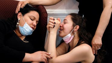 Viewing service of Jose Holguin, 50, who died of complications related to coronavirus disease (COVID-19) in Manhattan, New York City. (Reuters)