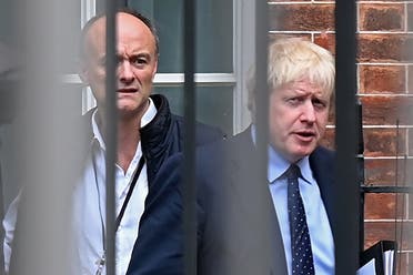 In this file photo taken on September 03, 2019 Britain's Prime Minister Boris Johnson (R) and his special advisor Dominic Cummings leave from the rear of Downing Street in central London. (AFP)