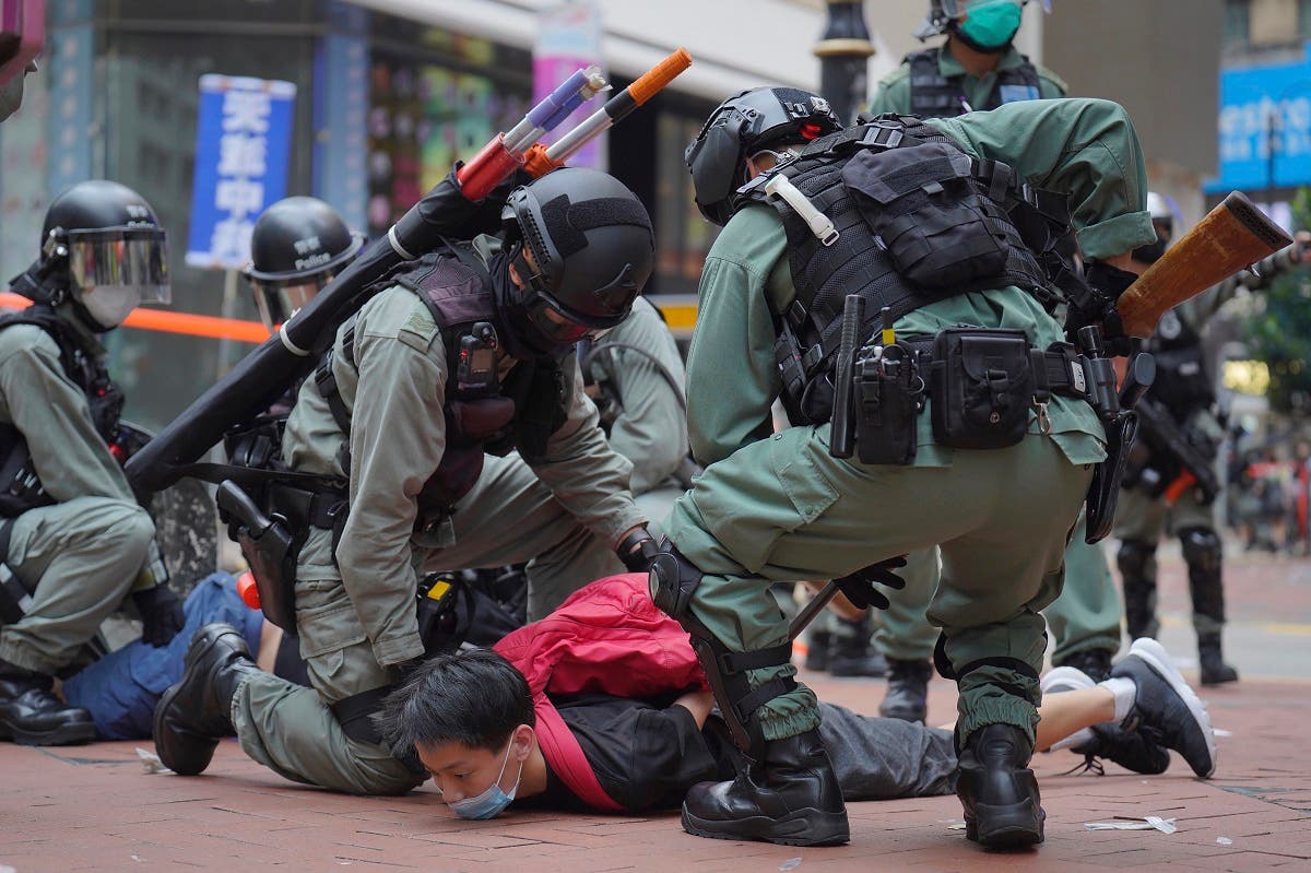 Riot police detain a protester during a demonstration against Beijing’s national security legislation in Causeway Bay in Hong Kong, on May 24, 2020. (AP)