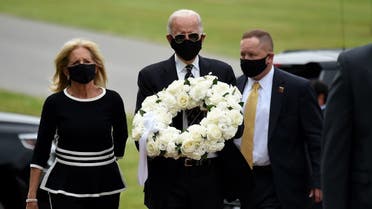 Biden with his wife Jill Biden, arrive to pay their respects to fallen service members on Memorial Day at Delaware Memorial Bridge Veteran's Memorial Park in Newcastle, Delaware, May 25, 2020. (AFP)