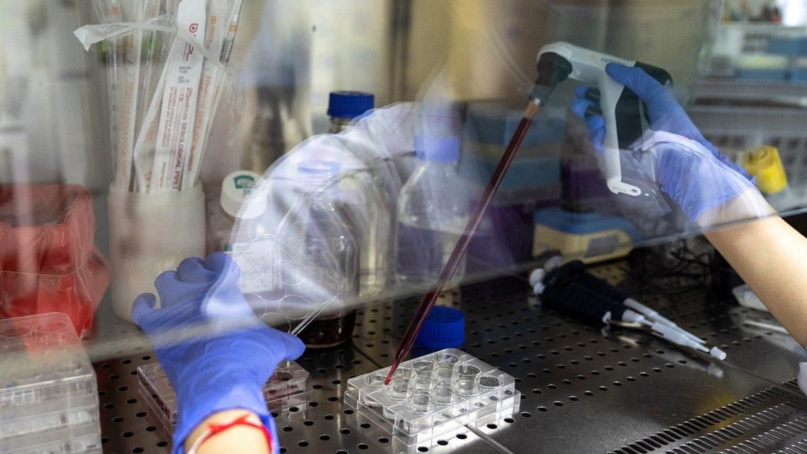 A researcher works inside a laboratory of Chulalongkorn University during the development of an mRNA type vaccine candidate for the coronavirus disease (COVID-19) in Bangkok, Thailand, May 25, 2020. (Reuters)