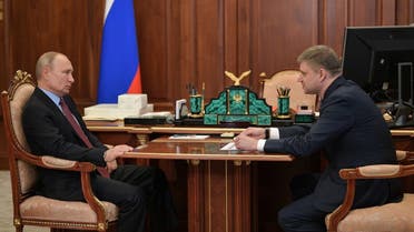 Russian President Vladimir Putin (L) speaks with Russian Railways CEO Oleg Belozyorov during their meeting at the Kremlin in Moscow on May 25, 2020. (AFP) 