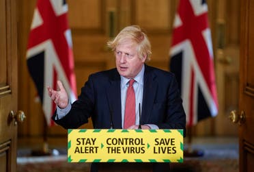 Britain's Prime Minister Boris Johnson holds a daily news conference with Public Health England's (PHE) Medical Director Yvonne Doyle (not pictured), on the coronavirus disease (COVID-19) outbreak, at 10 Downing Street in London, Britain May 25, 2020. (Reuters) 