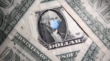 George Washington is seen with printed medical mask on the one dollar banknote in this illustration taken, March 31, 2020. (Reuters)