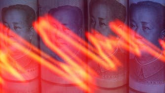 Dollar slips as Chinese yuan strengthens