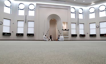 Amid concerns of the spread of COVID-19, a small group prays inside an empty mosque before an Eid al-Fitr celebration in Plano, Texas, Sunday, May 24, 2020. (AP)