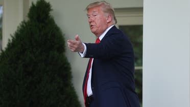 U.S. President Donald Trump beckons his guests to join him in the Oval Office after speaking about negotiations with pharmaceutical companies over the cost of insulin for U.S. seniors on Medicare at an event in the Rose Garden at the White House during the coronavirus disease (COVID-19) outbreak in Washington, U.S. May 26, 2020. REUTERS/Jonathan Ernst