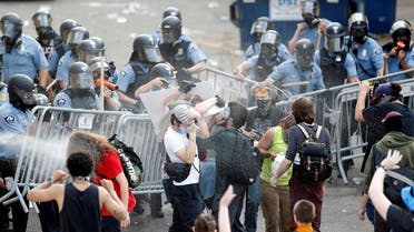 Police spray mace at protestors to break up a gathering near the Minneapolis Police third precinct after a white police officer was caught on a bystander's video pressing his knee into the neck of African-American man George Floyd, who later died at a hospital, in Minneapolis, Minnesota, U.S. May 27, 2020. (Reuters)