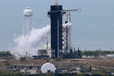 A SpaceX Falcon 9 rocket purges fuel after topping off before scheduled launch of NASA's SpaceX Demo-2 mission to the International Space Station from NASA's Kennedy Space Center in Cape Canaveral. (Reuters)