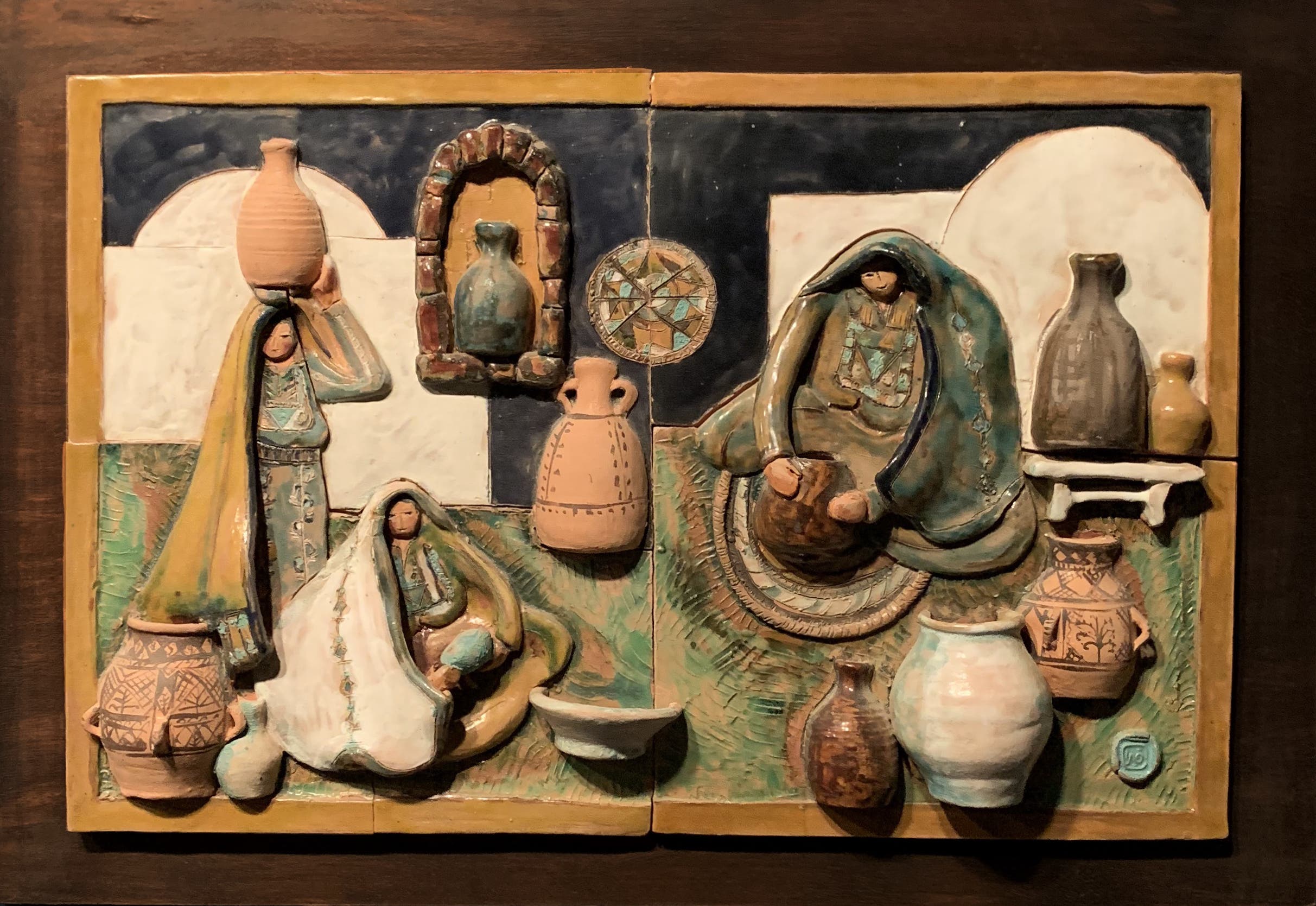 Vera Tamari, Palestinian Women at Work, 1979, Ceramic relief. (Image courtesy of Barjeel Art Foundation, Sharjah.)