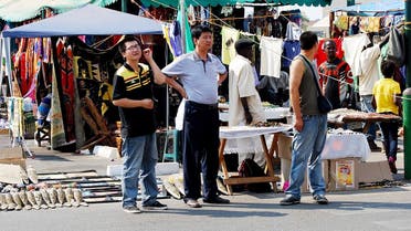 A file photo of Chinese nationals walk around Arcades Shopping complex’s Pakati Market on October 25, 2010 in Lusaka, Zambia. (File photo: AFP)