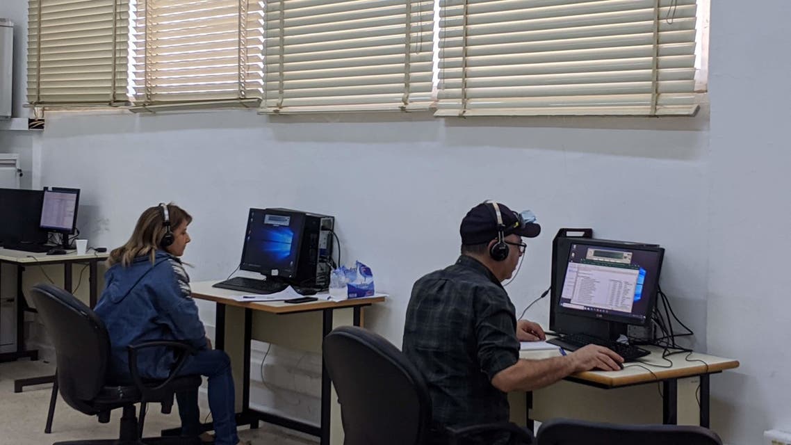 Volunteers work at the coronavirus hotline at Rafik Hariri Hospital in Beirut, Lebanon. (Emily Lewis)