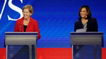 Senator Elizabeth Warren and Senator Kamala Harris smile during the 2020 Democratic US presidential debate in Houston, Texas, US, September 12, 2019. (Reuters)