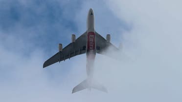 An Emirates Airlines passenger jet in the air. (File photo: AFP)