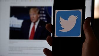 Twitter hides Trump tweet for ‘glorifying violence’ amid escalating feud