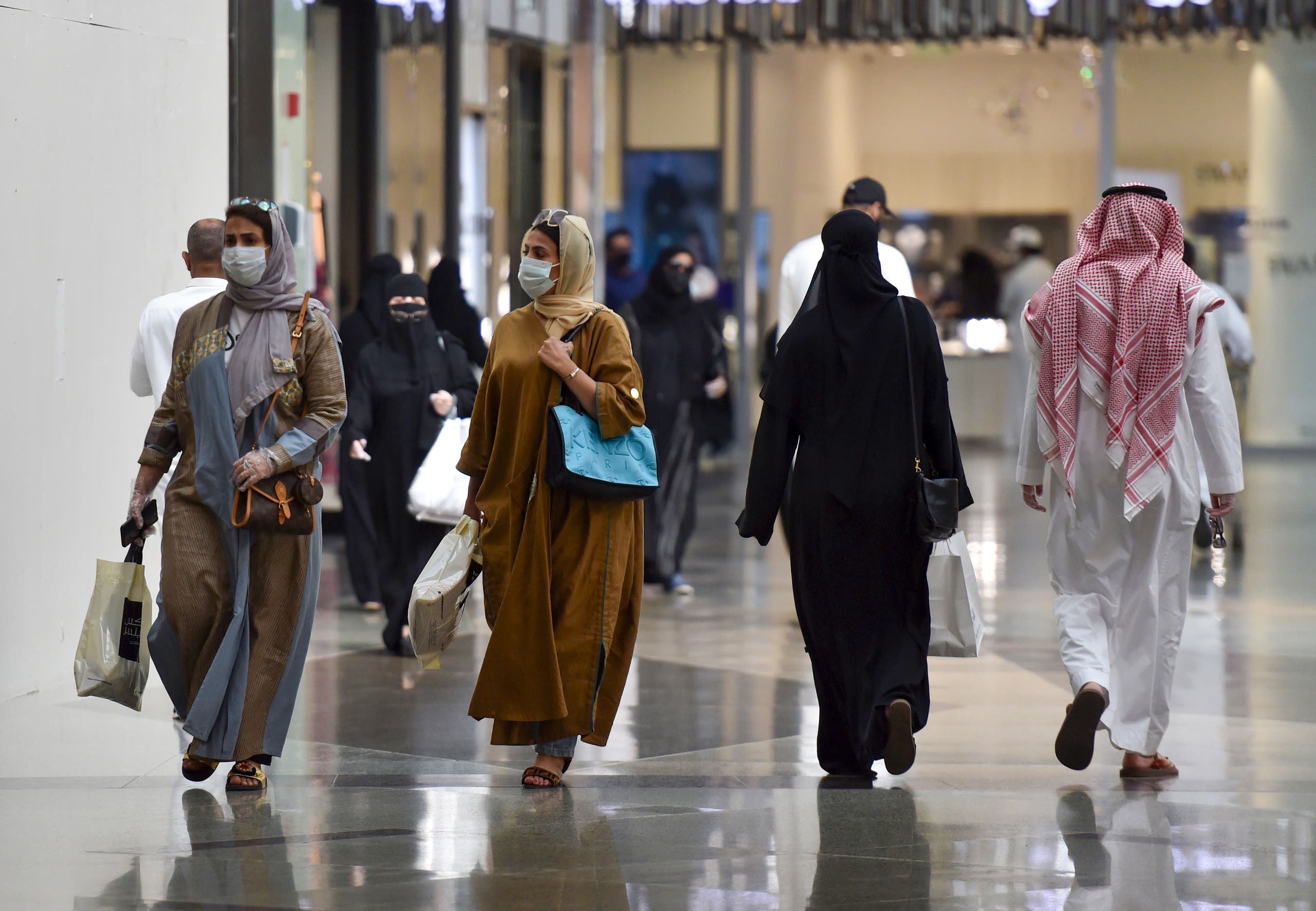 Saudis shop at the Panorama Mall in the capital Riyadh on May 22, 2020. (AFP)