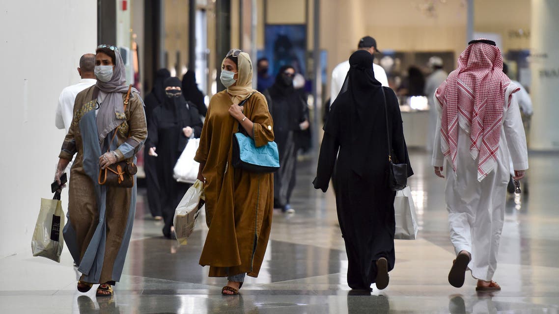 Saudis shop at the Panorama Mall in the capital Riyadh on May 22, 2020. (AFP)