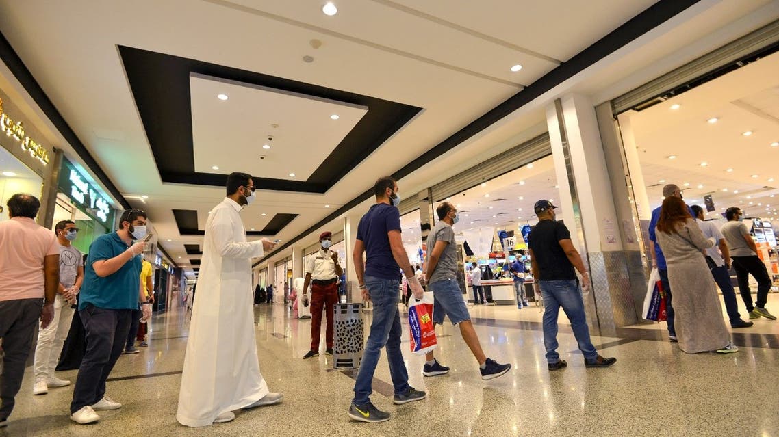 Saudis shop at the Panorama Mall in the capital Riyadh on May 22, 2020. (AFP)