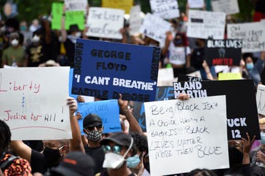 Demonstrators protest in Centennial Olympic Park, Friday, May 29, 2020 in Atlanta. (AP)