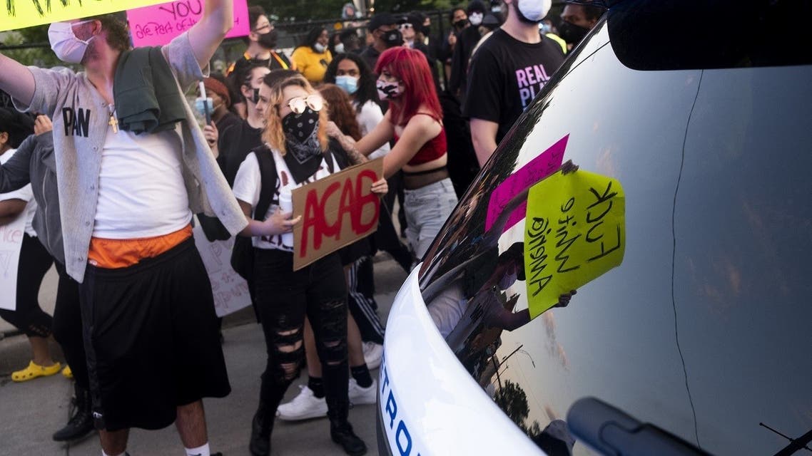 Protesters and Detroit Riot Police officers engage in an escalating series of confrontations in Downtown Detroit following a day of protests for the death of George Floyd on May 29, 2020 in Detroit, Michigan. (AFP)