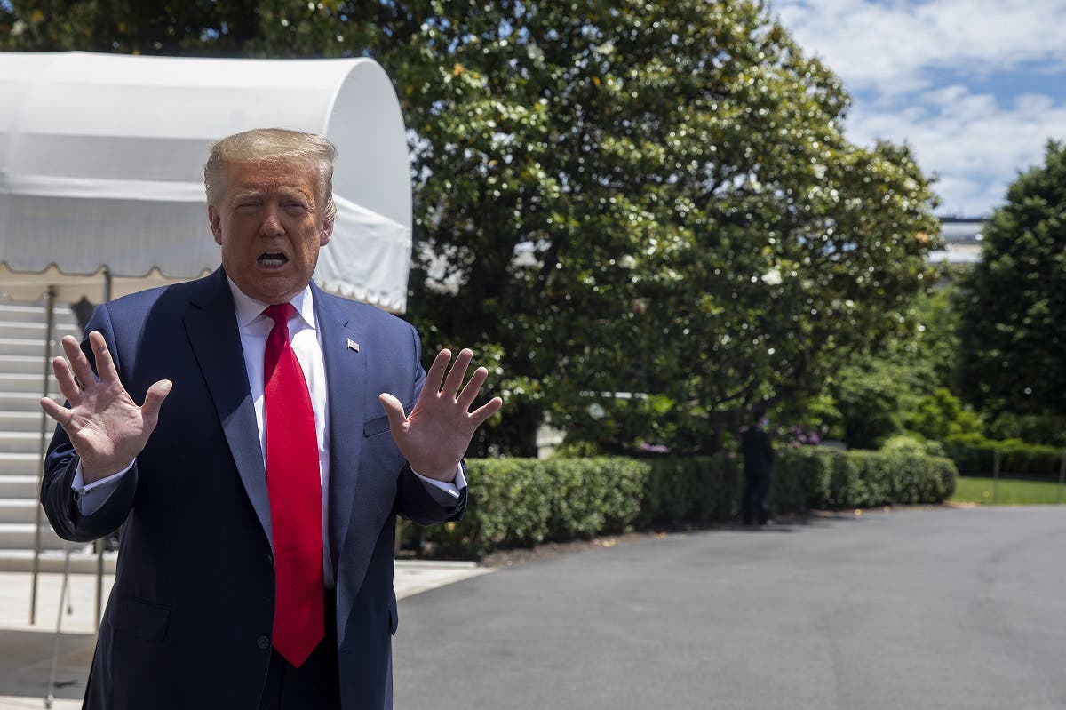 Trump talks to the media outside the White House as he heads to the SpaceX launch in Florida on May 30, 2020 in Washington, DC. (AFP)