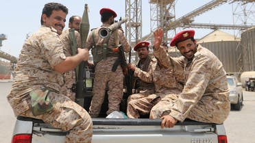 Yemen's Houthi movement forces ride in the back of a vehicle during withdrawal from Saleef port in Hodeidah province, Yemen May 11, 2019. Picture taken May 11, 2019. REUTERS/Abduljabbar Zeyad