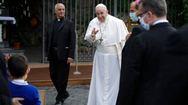Pope Francis waves as he leaves after a rosary in Vatican gardens Saturday, May 30, 2020. (AP)