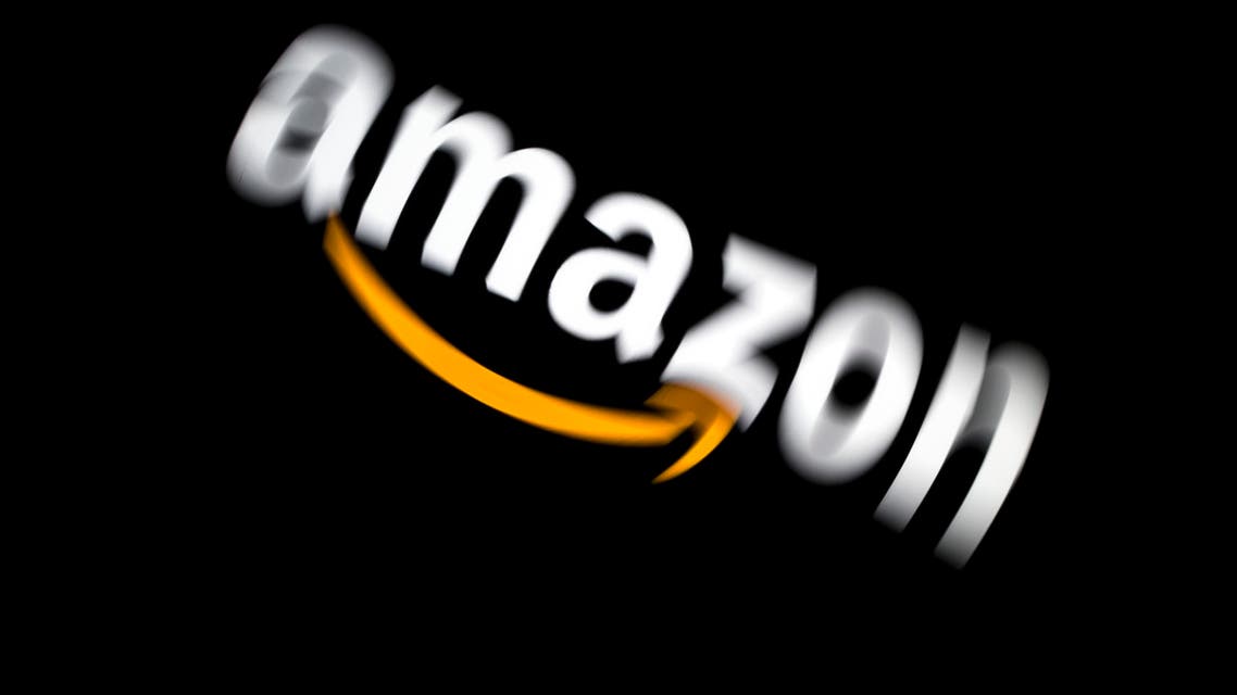 A picture taken on February 5, 2019 shows the Amazon logo displayed on a tablet in Paris.