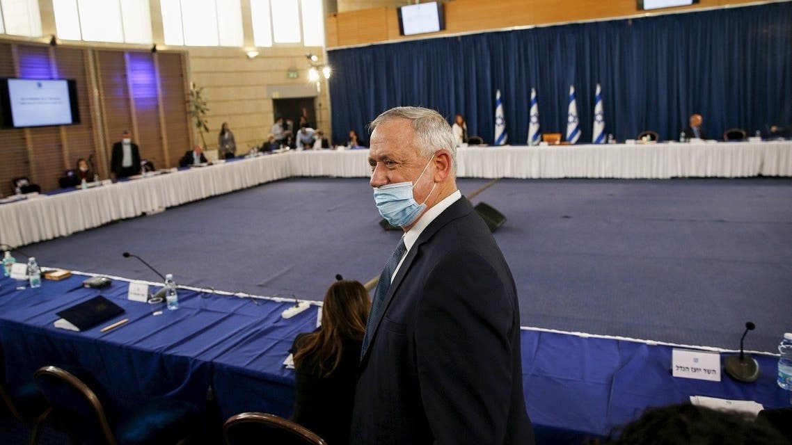 Israeli Defence Minister and Alternate Prime Minister Benny Gantz, wearing a protective face mask, arrives for the weekly cabinet meeting in Jerusalem on May 31, 2020. (AFP)