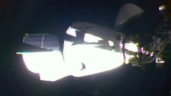 SpaceX Crew Dragon capsule docks with International Space Station