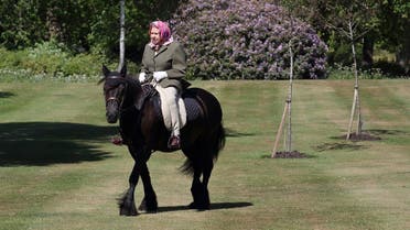 Britain's Queen Elizabeth II rides Balmoral Fern, a 14-year-old Fell Pony, in Windsor Home Park, west of London, over the weekend of May 30 and May 31, 2020. (AFP) 